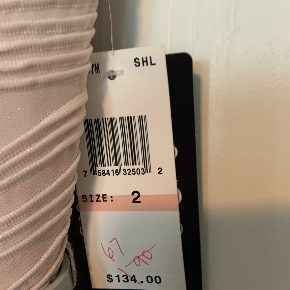 Plush cocktail dress. Silver belt at waist